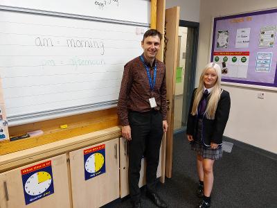 Carlibar Primary teacher Peter Mullan with Barrhead High pupil Amy Tasker