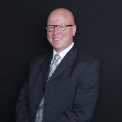 Councillor Colm Merrick